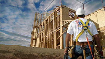  male workers using the fall protection system developed by TWR